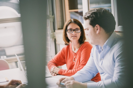 team members brainstorming during a brand strategy meeting